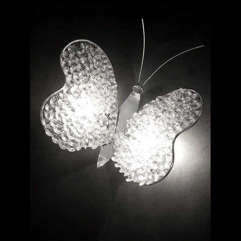 Farfalina Wall Sconce in a Room